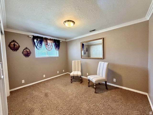 12080 Mill Ridge Circle Sandy, UT 84094 - Photo 26 of 56 Carpeted room featuring a single window with blinds, crown molding, a ceiling-mounted light fixture, and baseboards