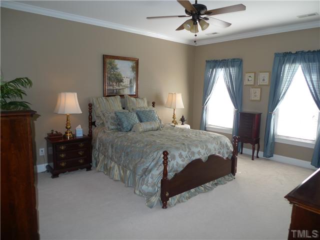 5306 Fiddlewood Court Raleigh, NC 27613 - Photo 5 of 14 Unwind after a long day...Lovely master offers two walk-in closets, updated bath with jetted tub!