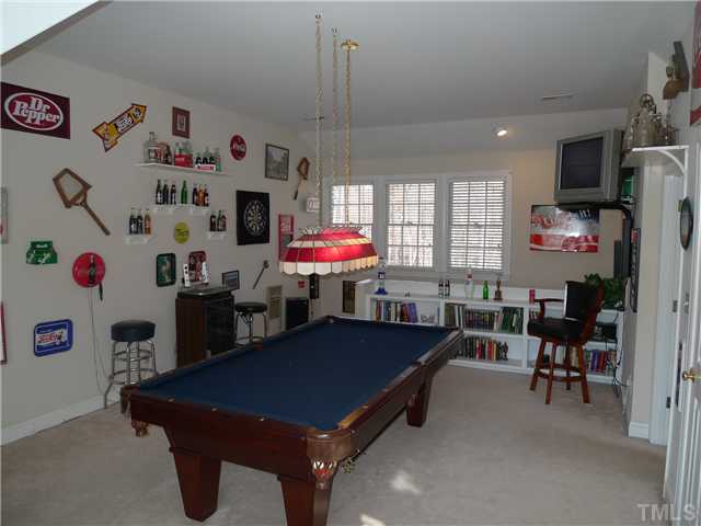 5306 Fiddlewood Court Raleigh, NC 27613 - Photo 8 of 14 Game time! Awesome bonus room with back stair access and hallway access. Don't miss the great flex space on the third floor!