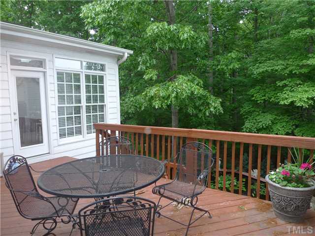 5306 Fiddlewood Court Raleigh, NC 27613 - Photo 10 of 14 Terrific deck for entertaining surrounded by nature