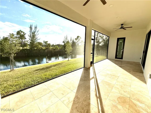 a view of swimming pool with seating space