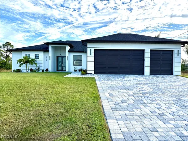 a front view of house with yard