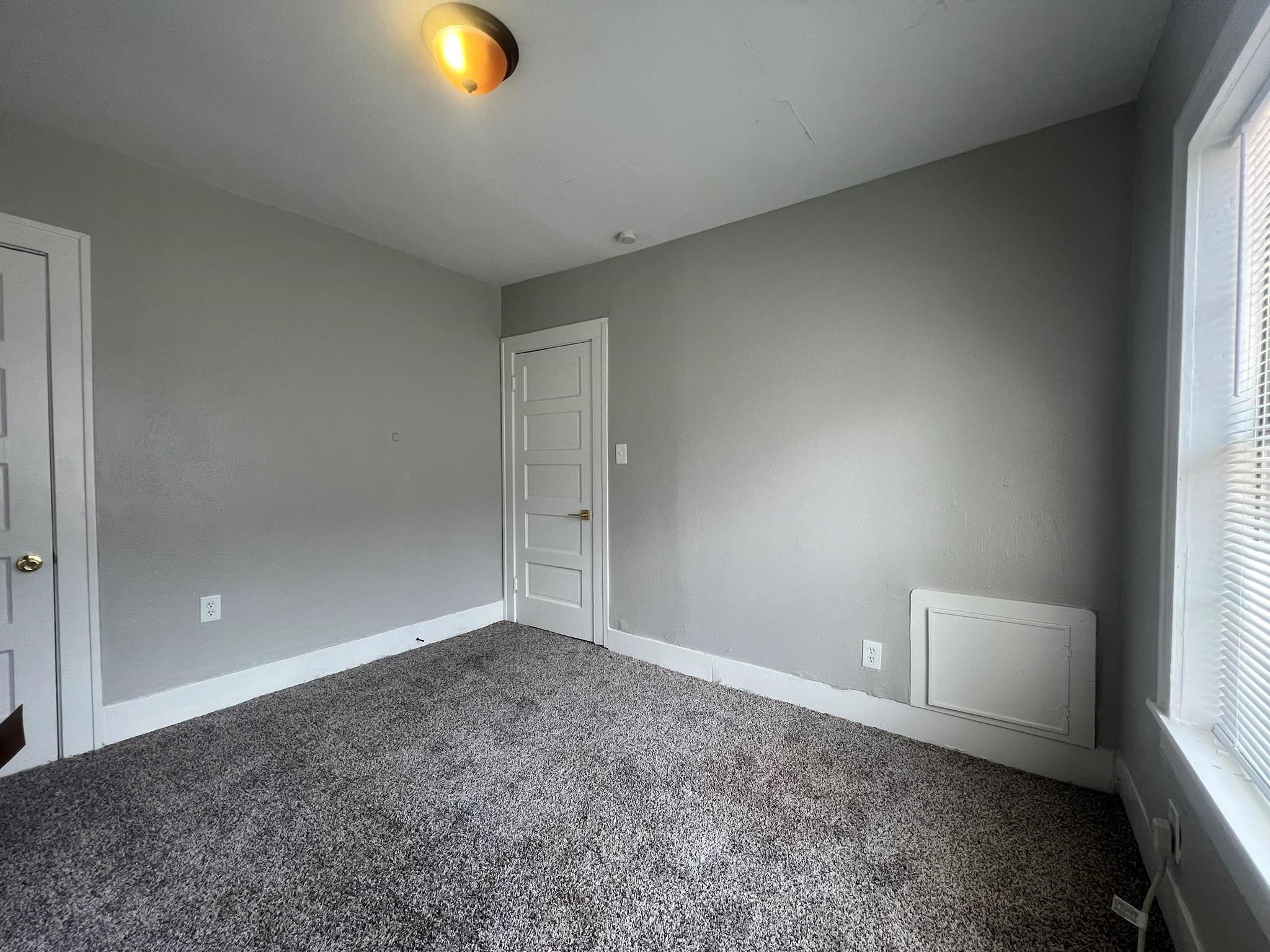 2531 Stevens Street Houston, TX 77026 - Photo 17 of 39 a view of an empty room and window