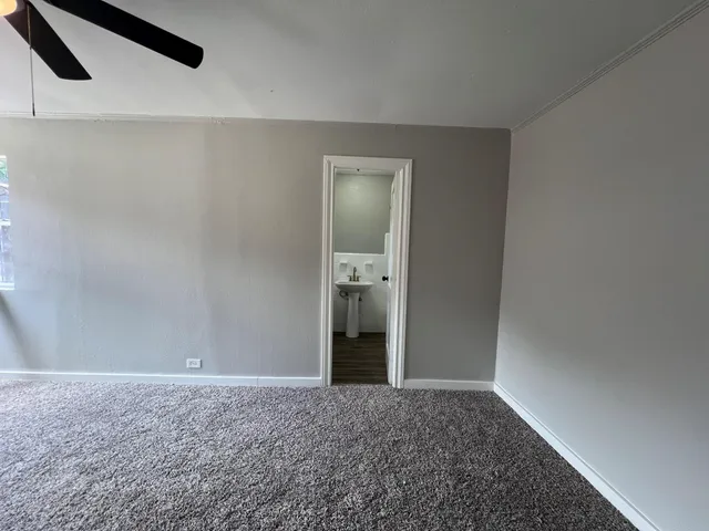 a view of an empty room and window