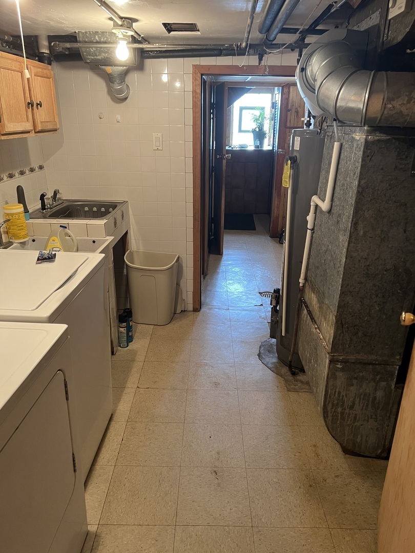 7416 West Addison Street Chicago, IL 60634 - Photo 14 of 19 a view of a storage & utility room