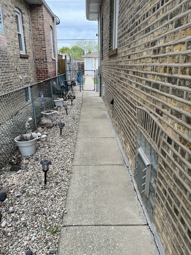 7416 West Addison Street Chicago, IL 60634 - Photo 17 of 19 a view of a patio with table and chairs