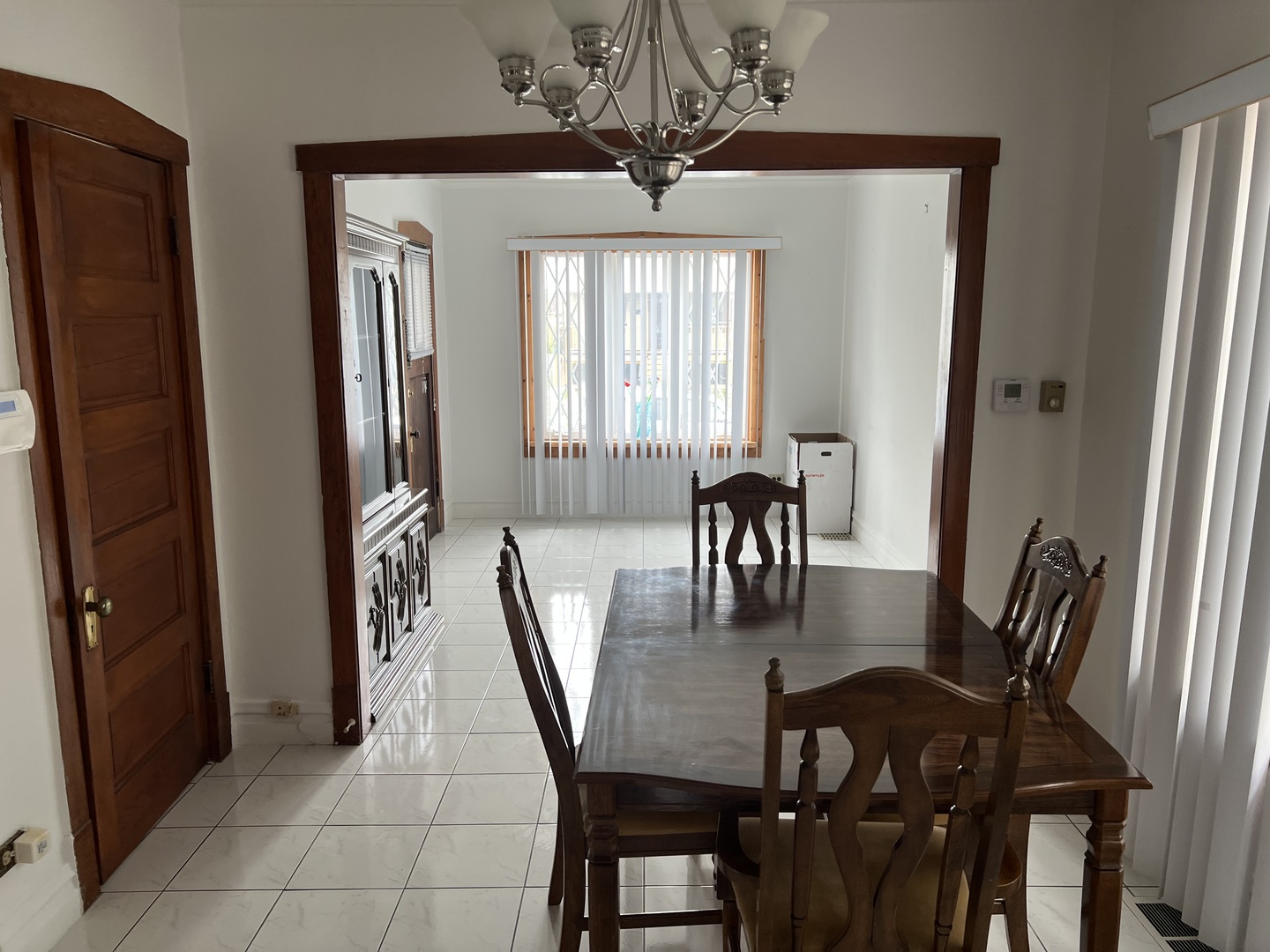 7416 West Addison Street Chicago, IL 60634 - Photo 3 of 19 a dining room with furniture and window