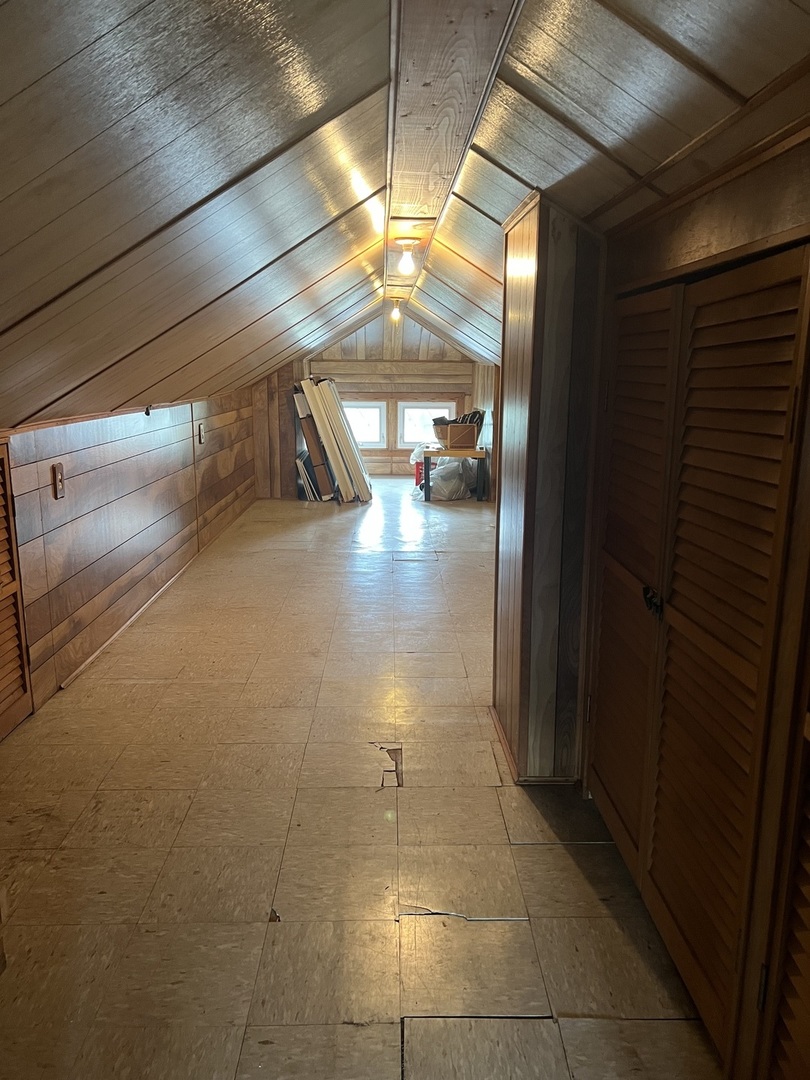 7416 West Addison Street Chicago, IL 60634 - Photo 10 of 19 a bathroom with a glass shower door