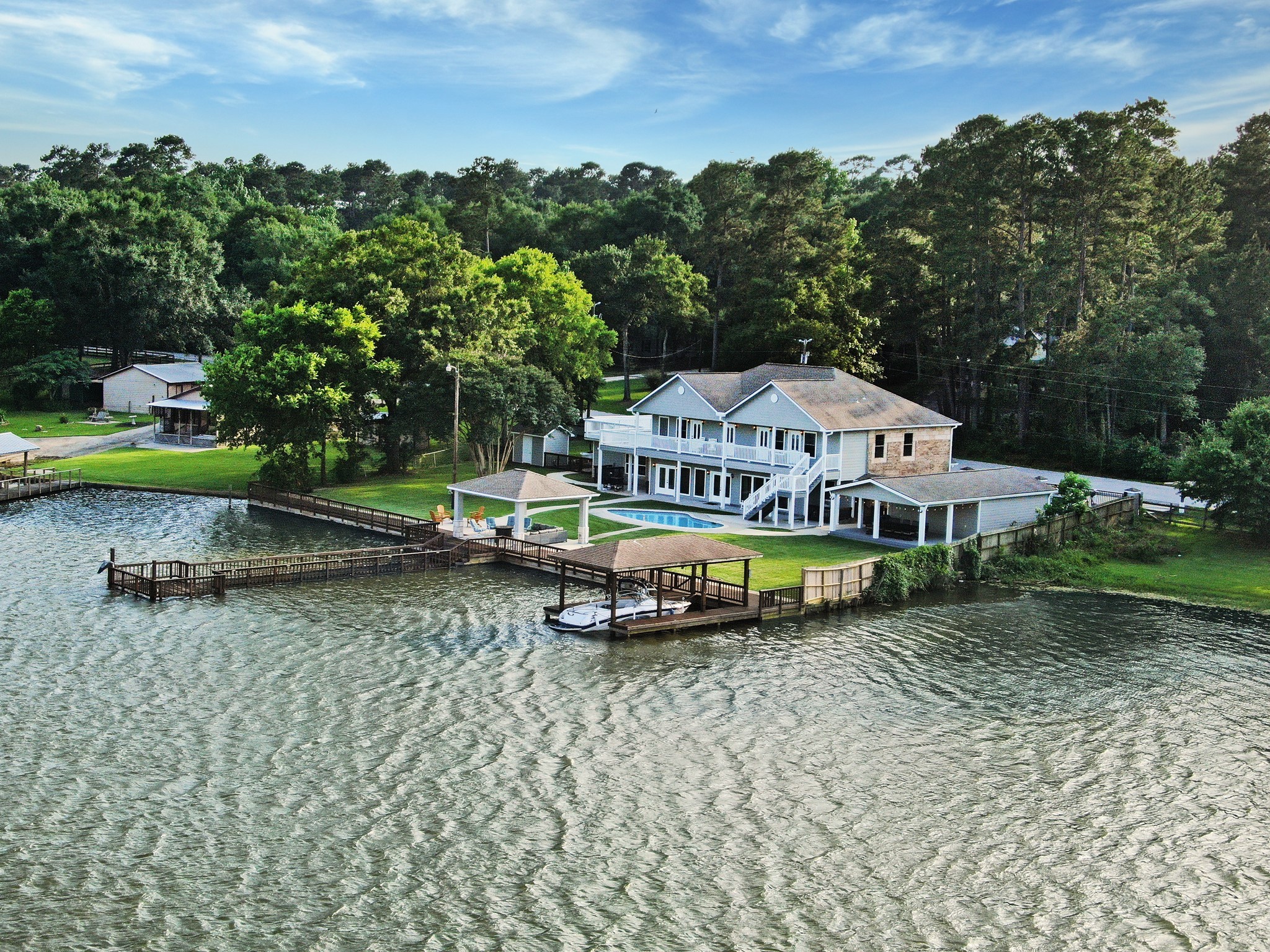 14362 Calvary Road Willis, TX 77318 - Photo 2 of 44 an aerial view of a garden with swimming pool