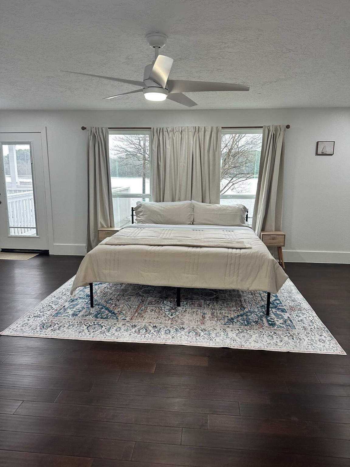14362 Calvary Road Willis, TX 77318 - Photo 22 of 44 a spacious bedroom with a bed rug and window