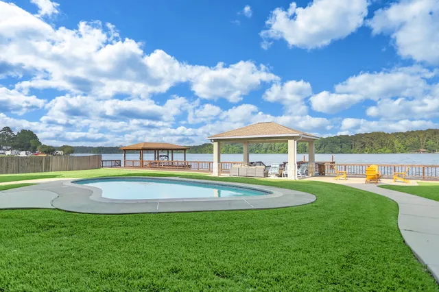 a view of a swimming pool and outdoor space
