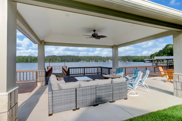 a view of a swimming pool with a patio