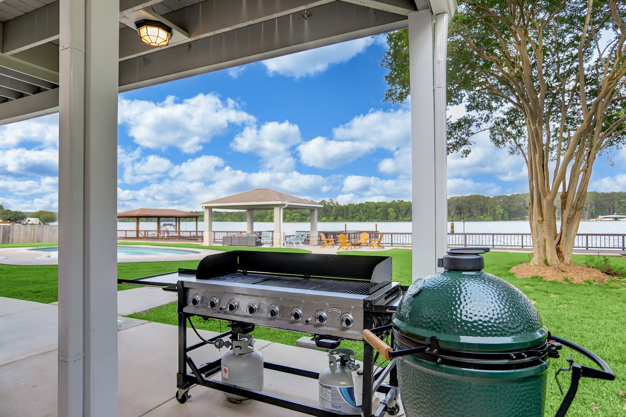 14362 Calvary Road Willis, TX 77318 - Photo 37 of 44 a living room with a table chairs and a floor to ceiling window