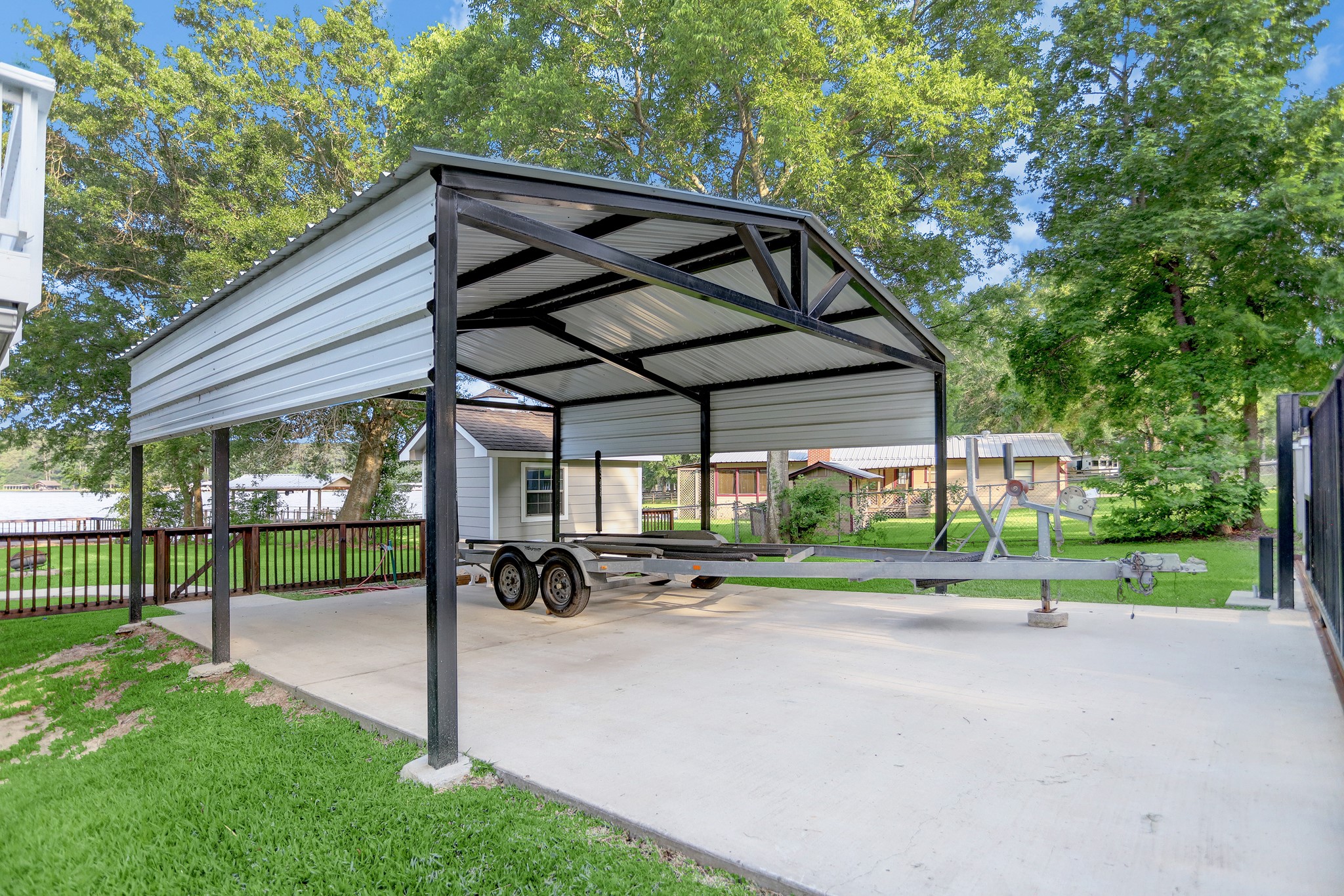 14362 Calvary Road Willis, TX 77318 - Photo 41 of 44 a view of park with bench and floor to ceiling window