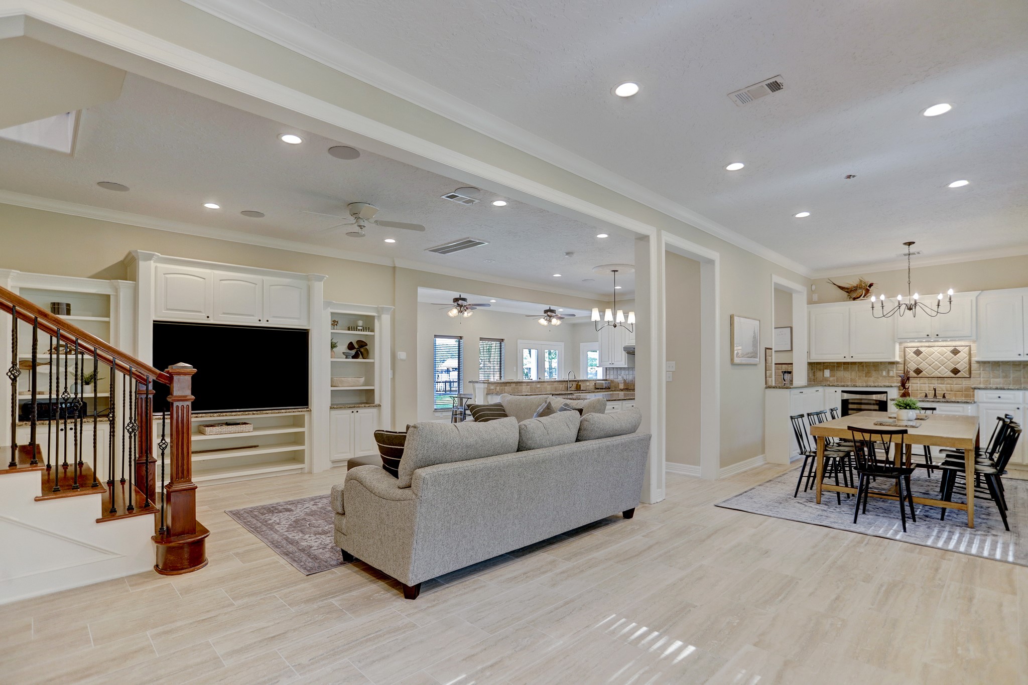14362 Calvary Road Willis, TX 77318 - Photo 6 of 44 a living room with furniture and a flat screen tv