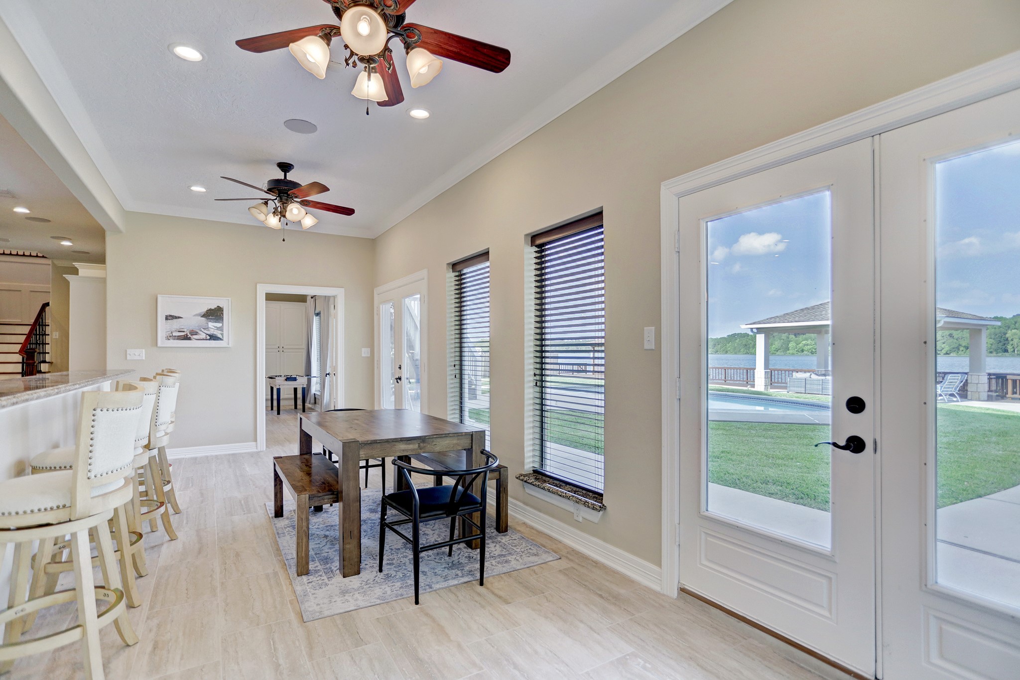 14362 Calvary Road Willis, TX 77318 - Photo 9 of 44 a view of a dining room with furniture window and wooden floor