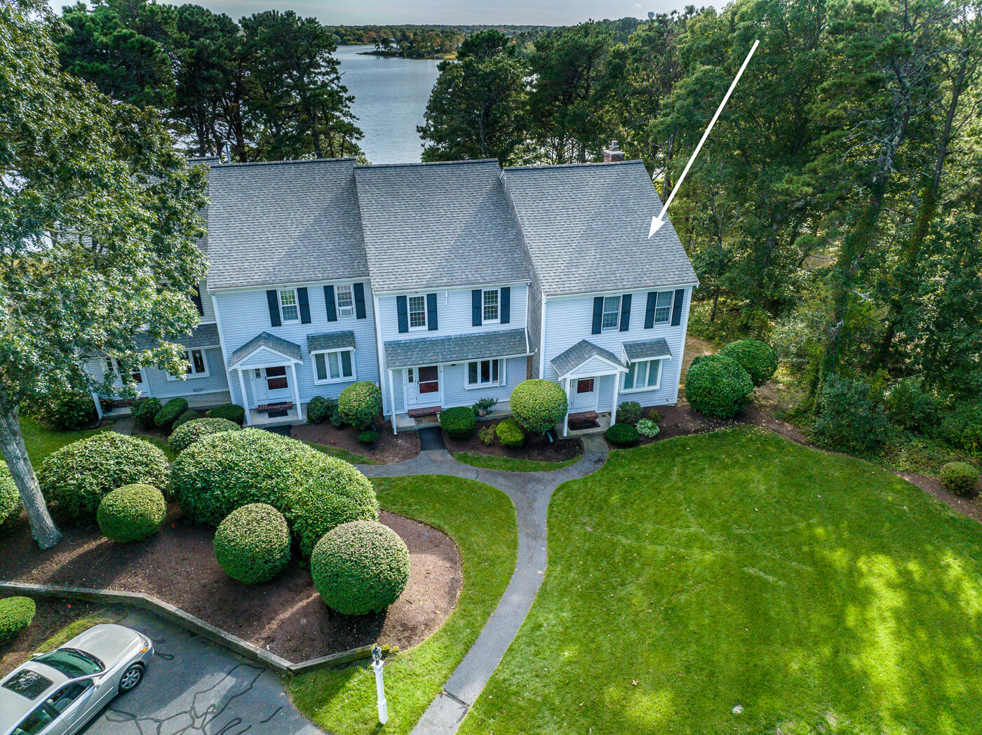 1 Calico Circle, Unit 1 Dennis, MA 02639 - Photo 2 of 52 a aerial view of a house with yard and green space