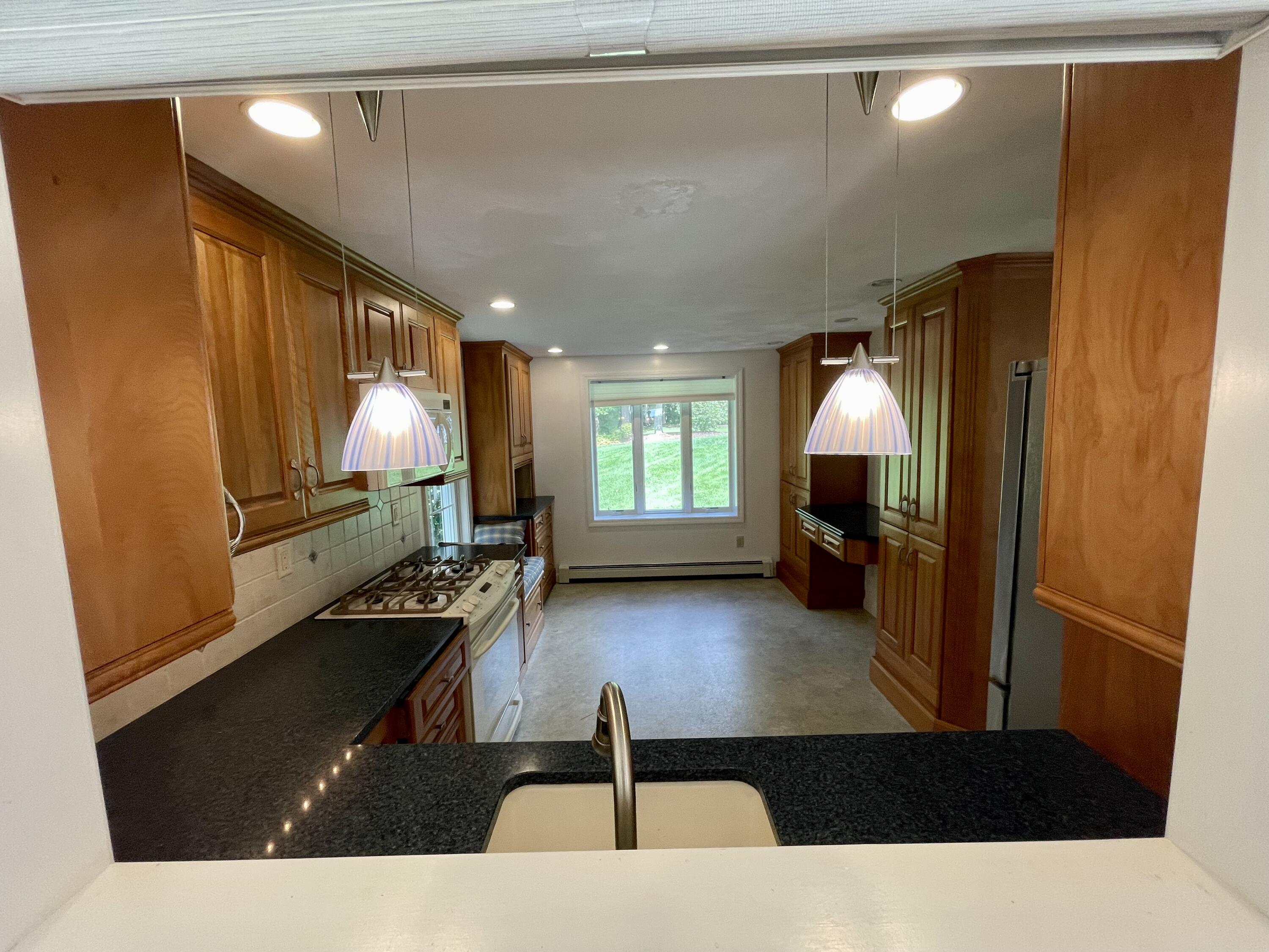 1 Calico Circle, Unit 1 Dennis, MA 02639 - Photo 21 of 52 a living room with furniture and a fireplace