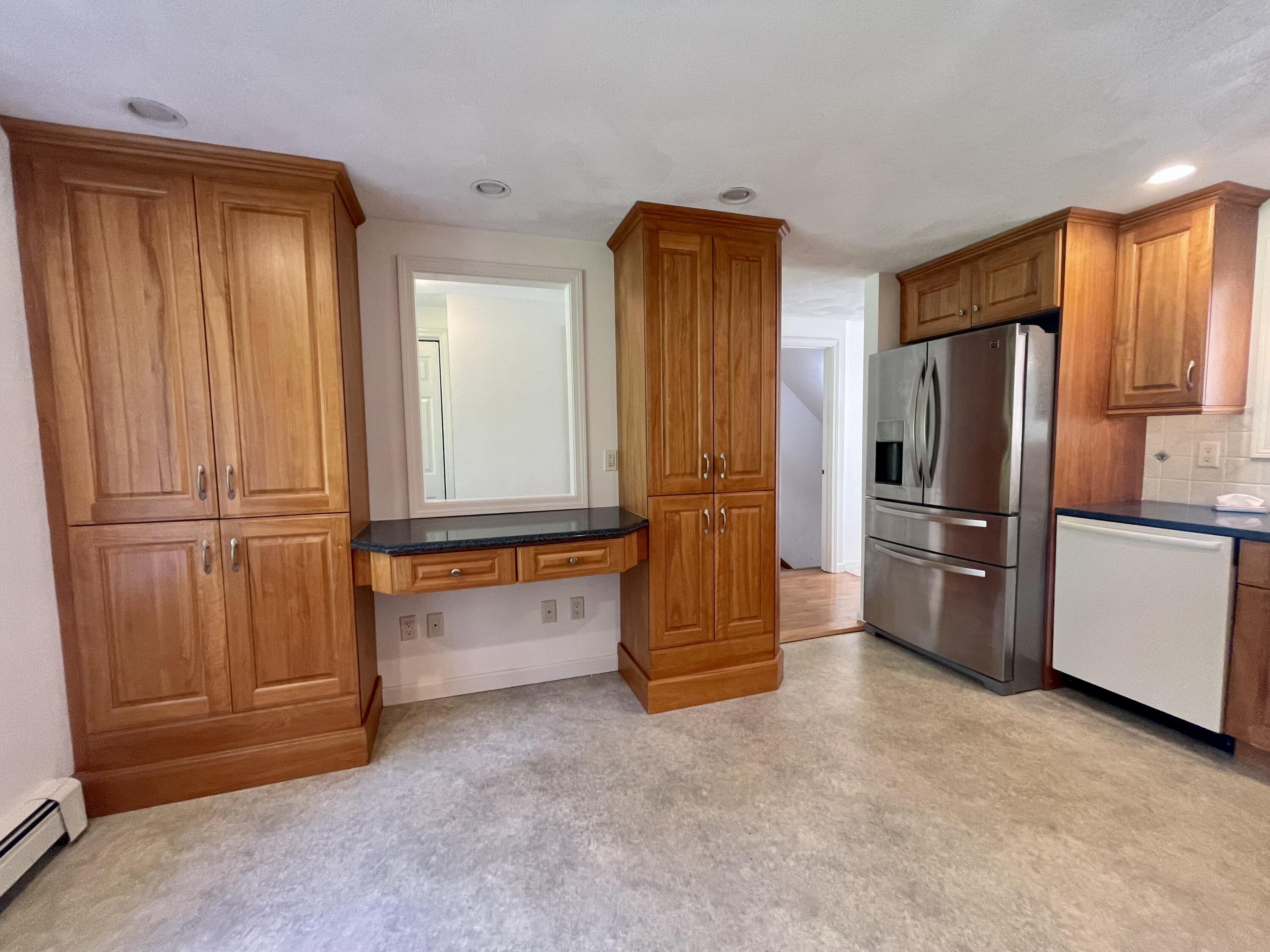1 Calico Circle, Unit 1 Dennis, MA 02639 - Photo 23 of 52 a view of kitchen with refrigerator and window