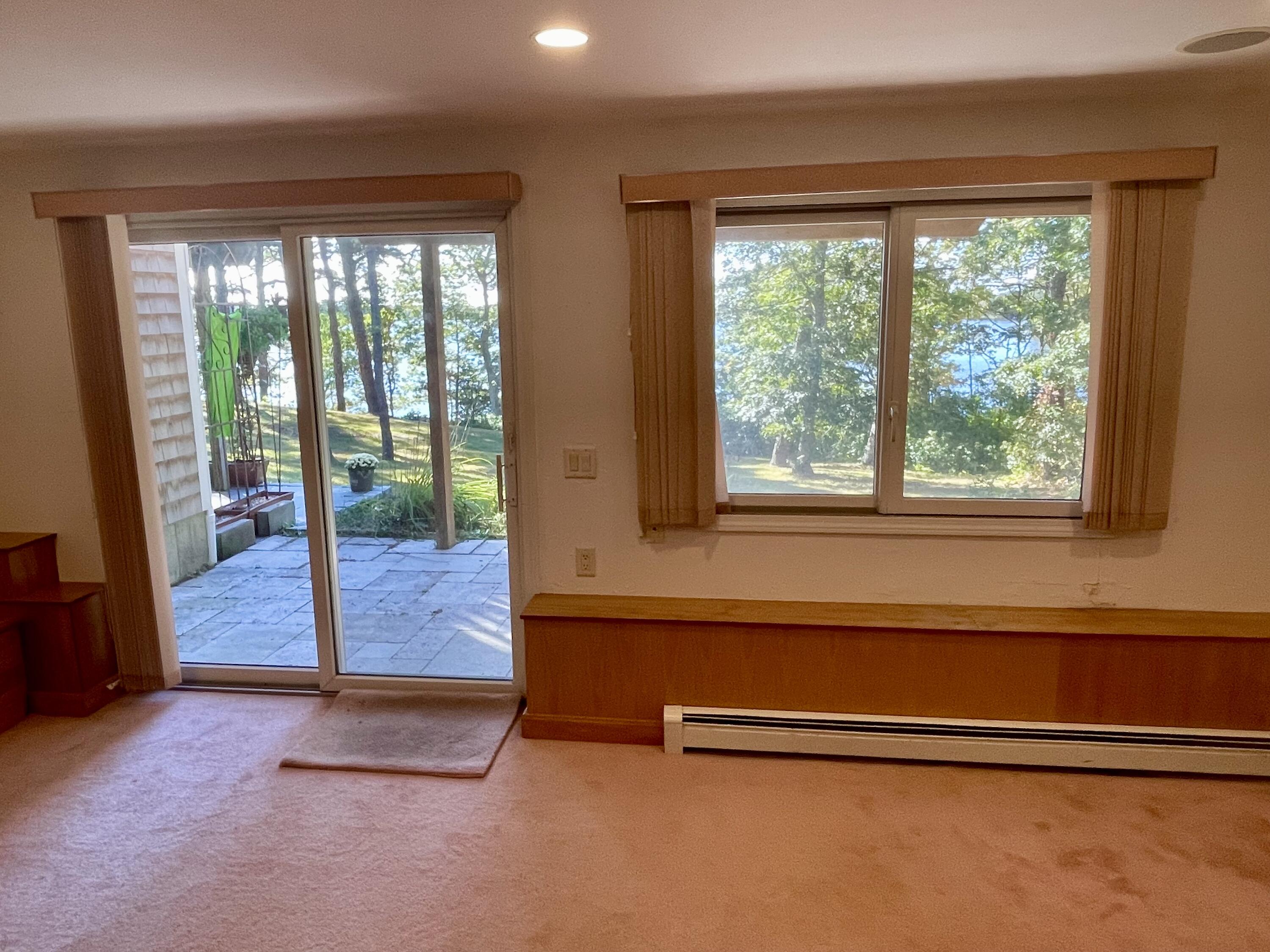 1 Calico Circle, Unit 1 Dennis, MA 02639 - Photo 29 of 52 a view of a room with a large window