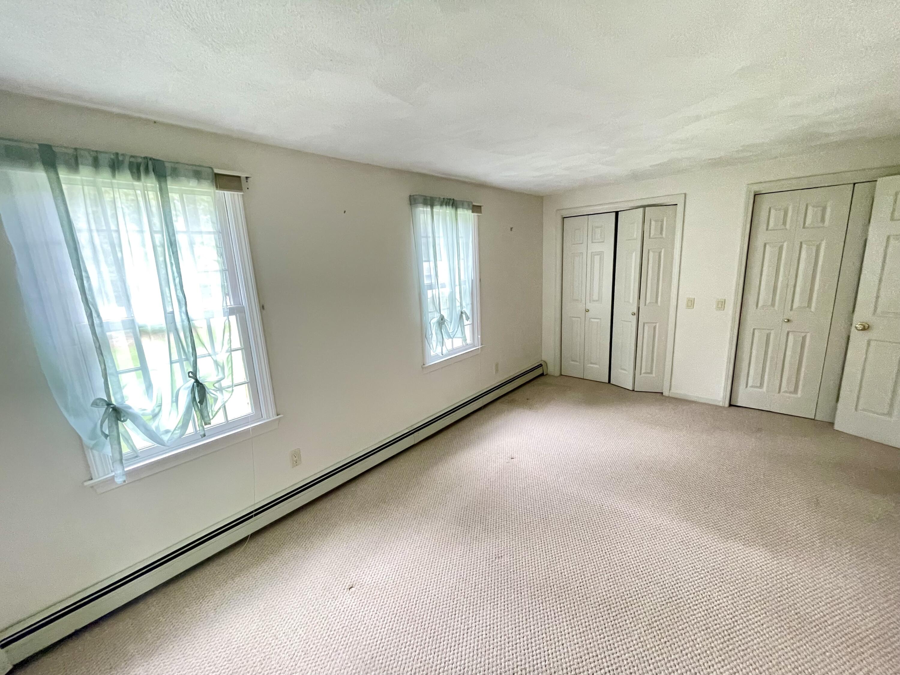 1 Calico Circle, Unit 1 Dennis, MA 02639 - Photo 40 of 52 a view of an empty room with a window