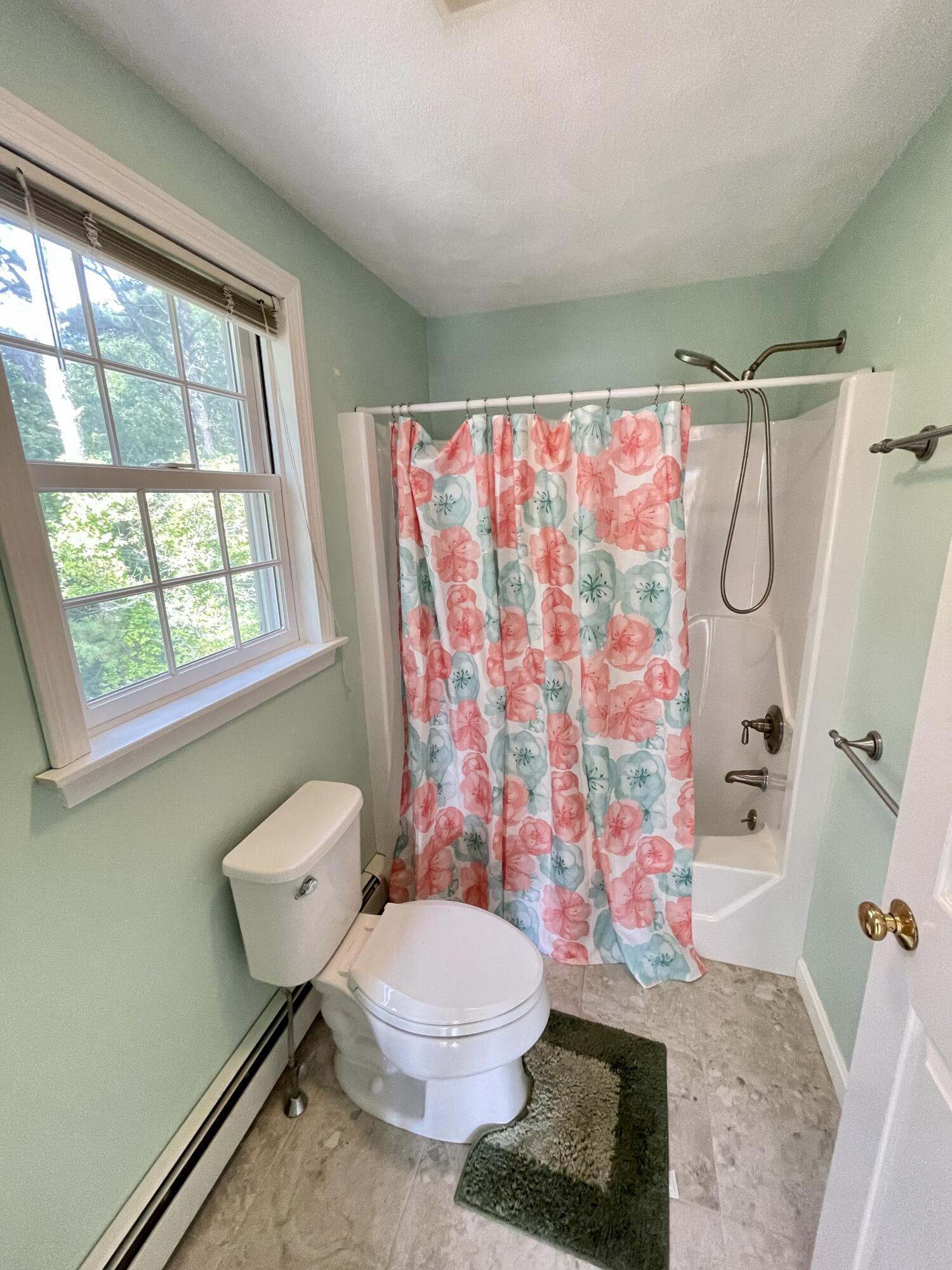 1 Calico Circle, Unit 1 Dennis, MA 02639 - Photo 44 of 52 a bathroom with a toilet sink and shower
