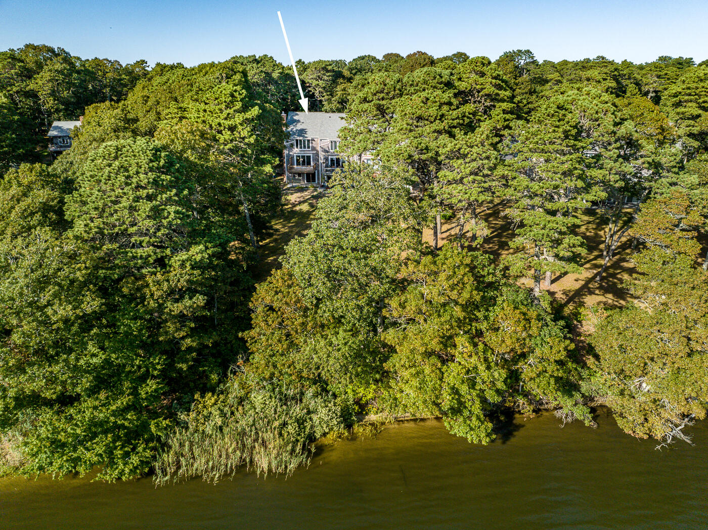 1 Calico Circle, Unit 1 Dennis, MA 02639 - Photo 45 of 52 a view of a large body of water with a large window