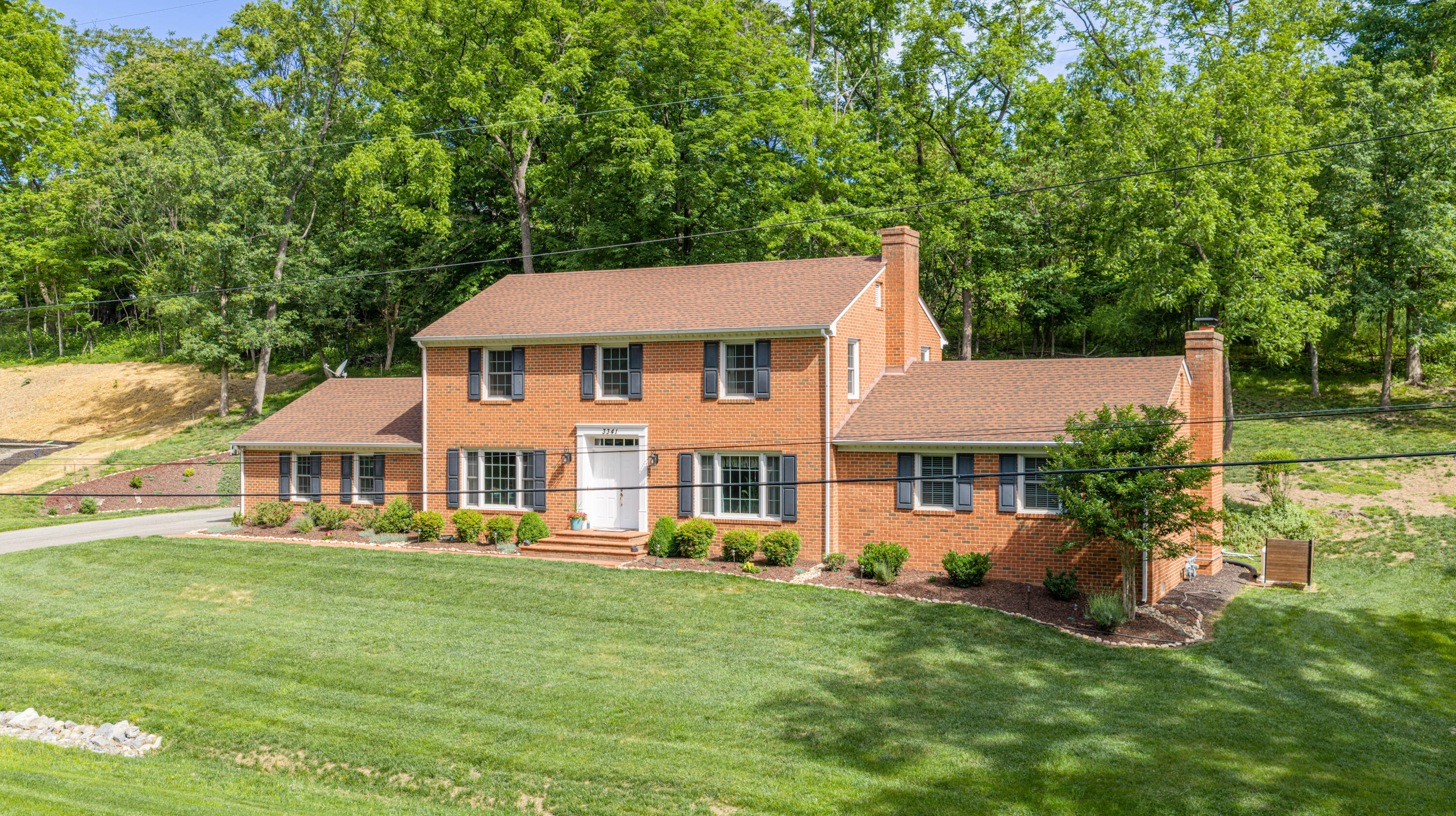 3341 Hidden Oak Road Southwest Roanoke, VA 24018 - Photo 1 of 26 front view of a house with a yard
