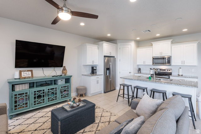 4845 Fishers Is Way St. George, UT 84770 - Photo 22 of 41 Living room featuring ceiling fan, recessed lighting, and light tile patterned floors