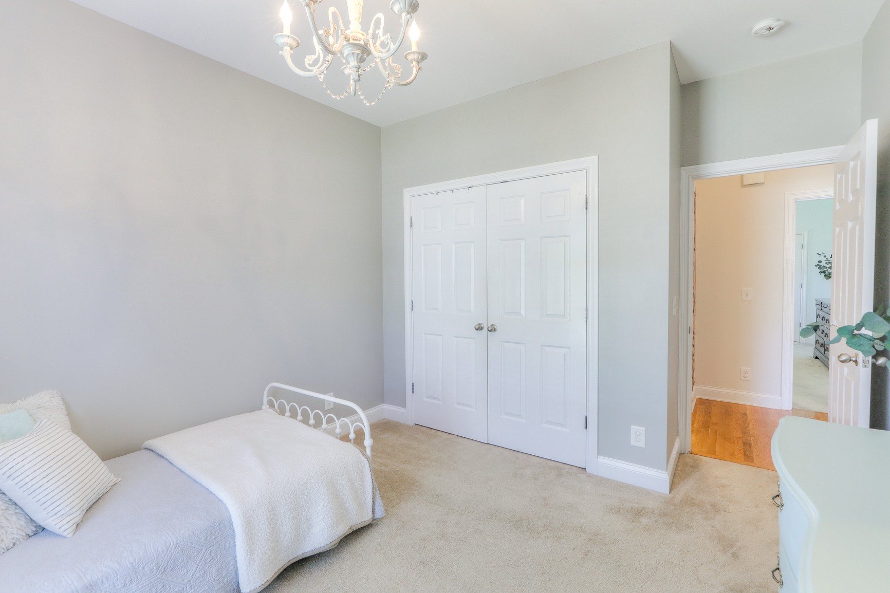 711 Heritage Road Lebanon, TN 37087 - Photo 20 of 49 a bedroom with a bed and a chandelier