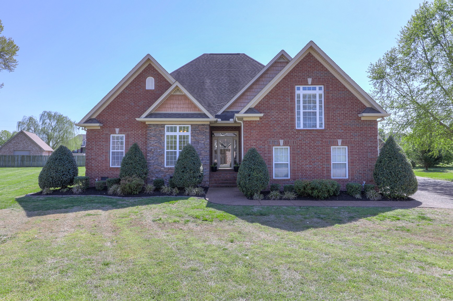 711 Heritage Road Lebanon, TN 37087 - Photo 3 of 49 a front view of a house with a yard