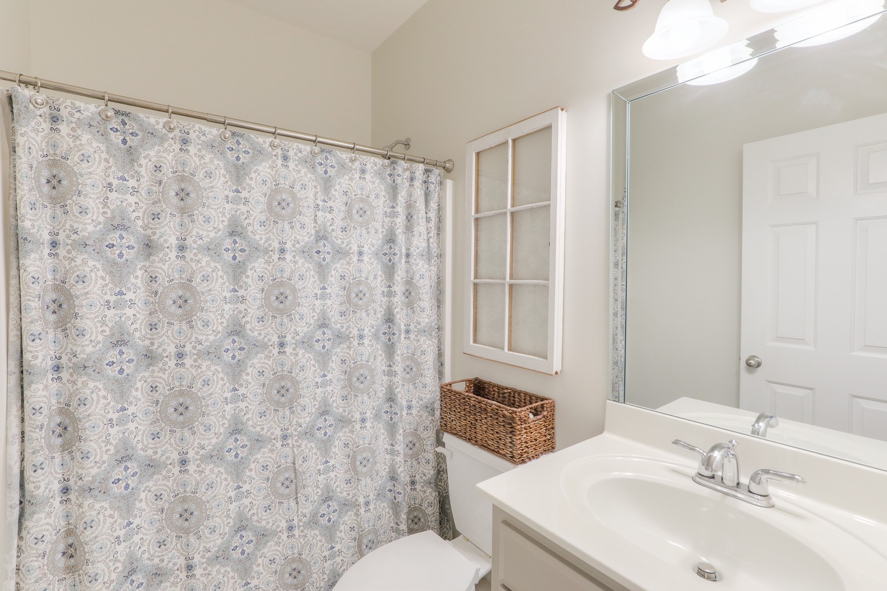 711 Heritage Road Lebanon, TN 37087 - Photo 23 of 49 a bathroom with a sink and a mirror