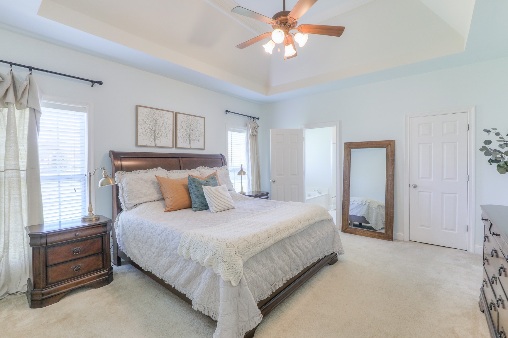 711 Heritage Road Lebanon, TN 37087 - Photo 24 of 49 a bedroom with a bed and a chandelier