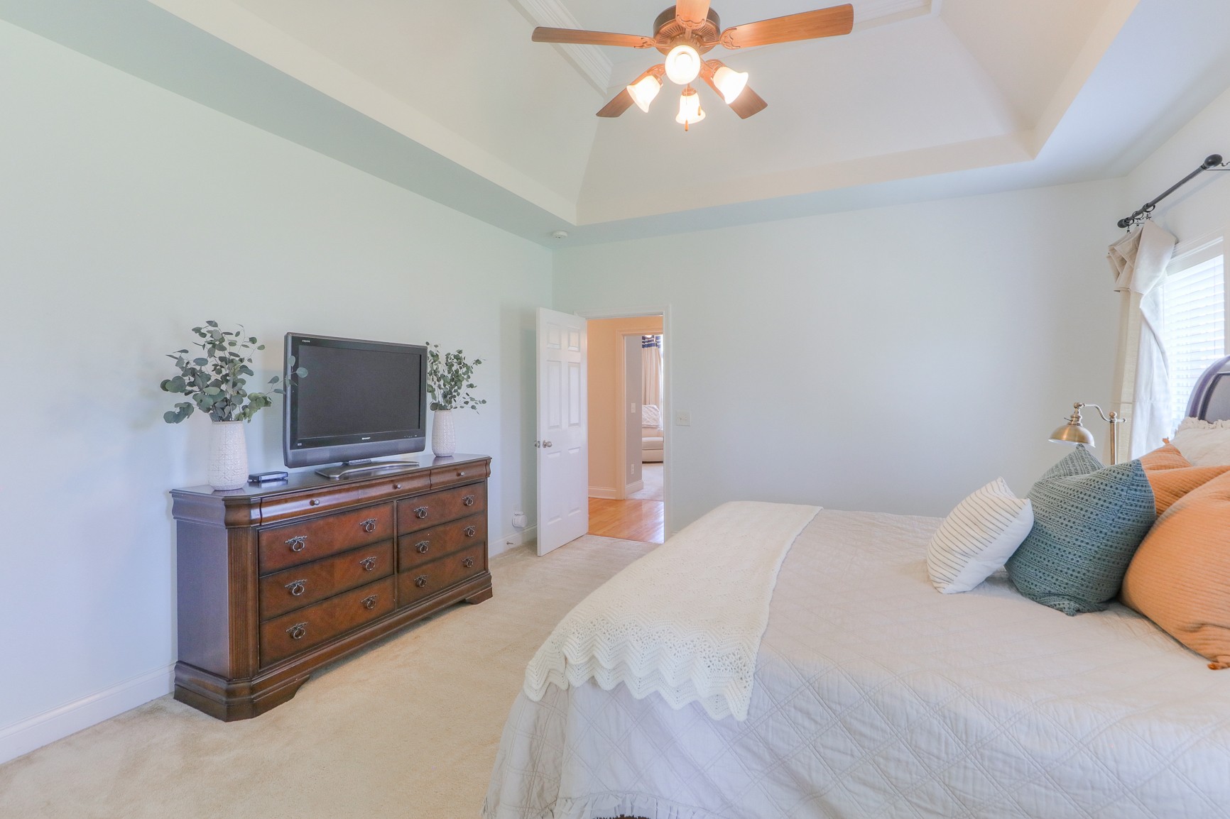 711 Heritage Road Lebanon, TN 37087 - Photo 25 of 49 a bedroom with a bed and a flat screen tv