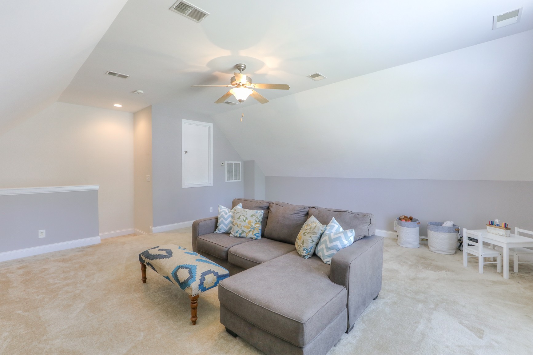 711 Heritage Road Lebanon, TN 37087 - Photo 31 of 49 a living room with furniture and a chandelier
