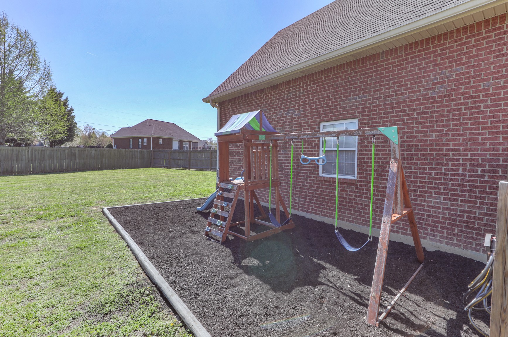 711 Heritage Road Lebanon, TN 37087 - Photo 37 of 49 a front view of a house with garden