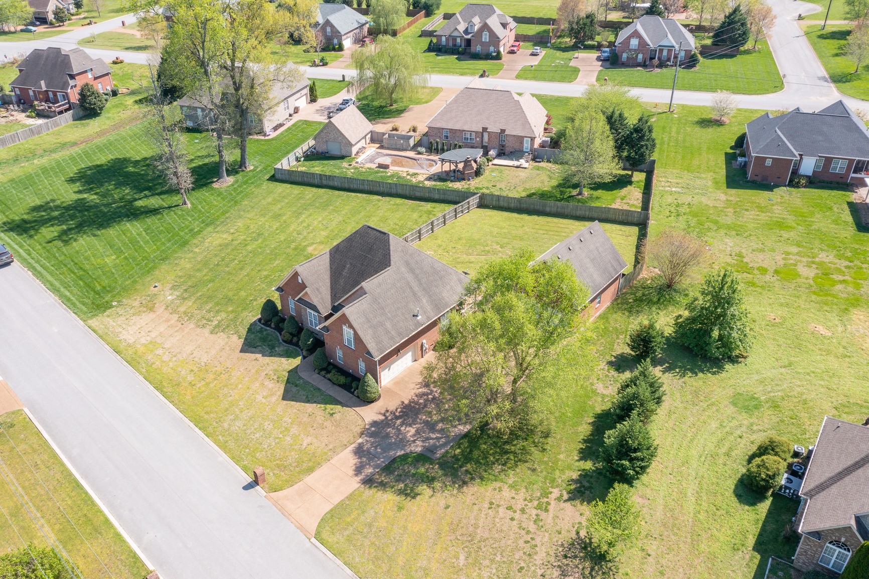 711 Heritage Road Lebanon, TN 37087 - Photo 49 of 49 a view of a swimming pool with a yard