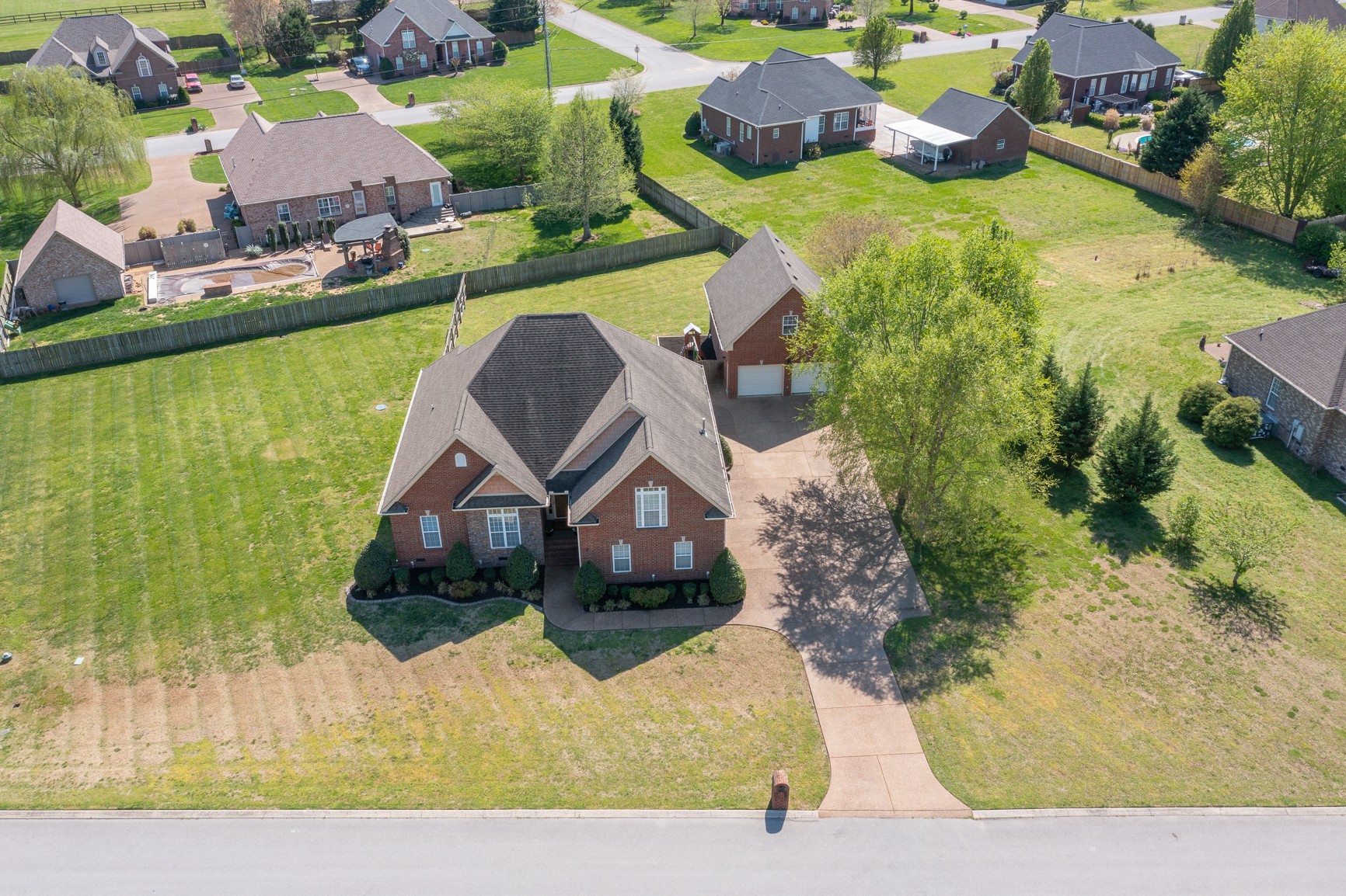 711 Heritage Road Lebanon, TN 37087 - Photo 6 of 49 an aerial view of a house with a yard basket ball court and outdoor seating