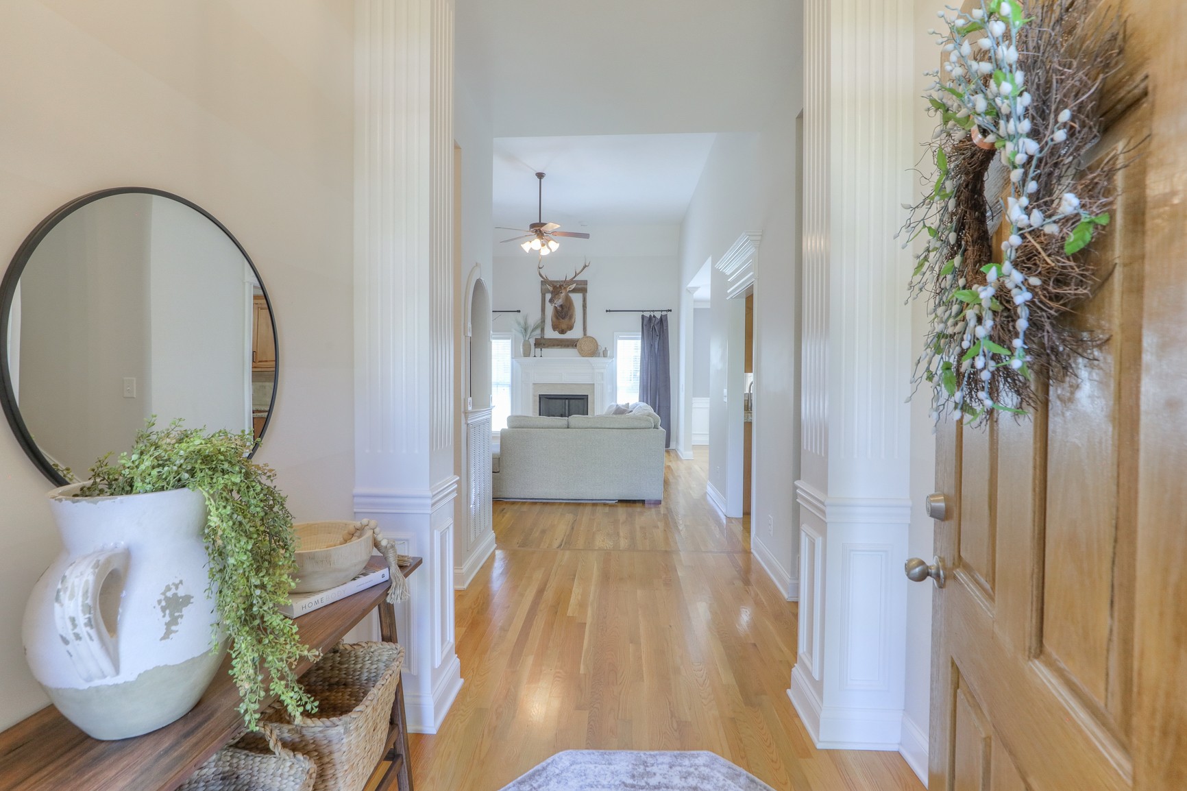 711 Heritage Road Lebanon, TN 37087 - Photo 7 of 49 a view of a hallway to a livingroom with furniture