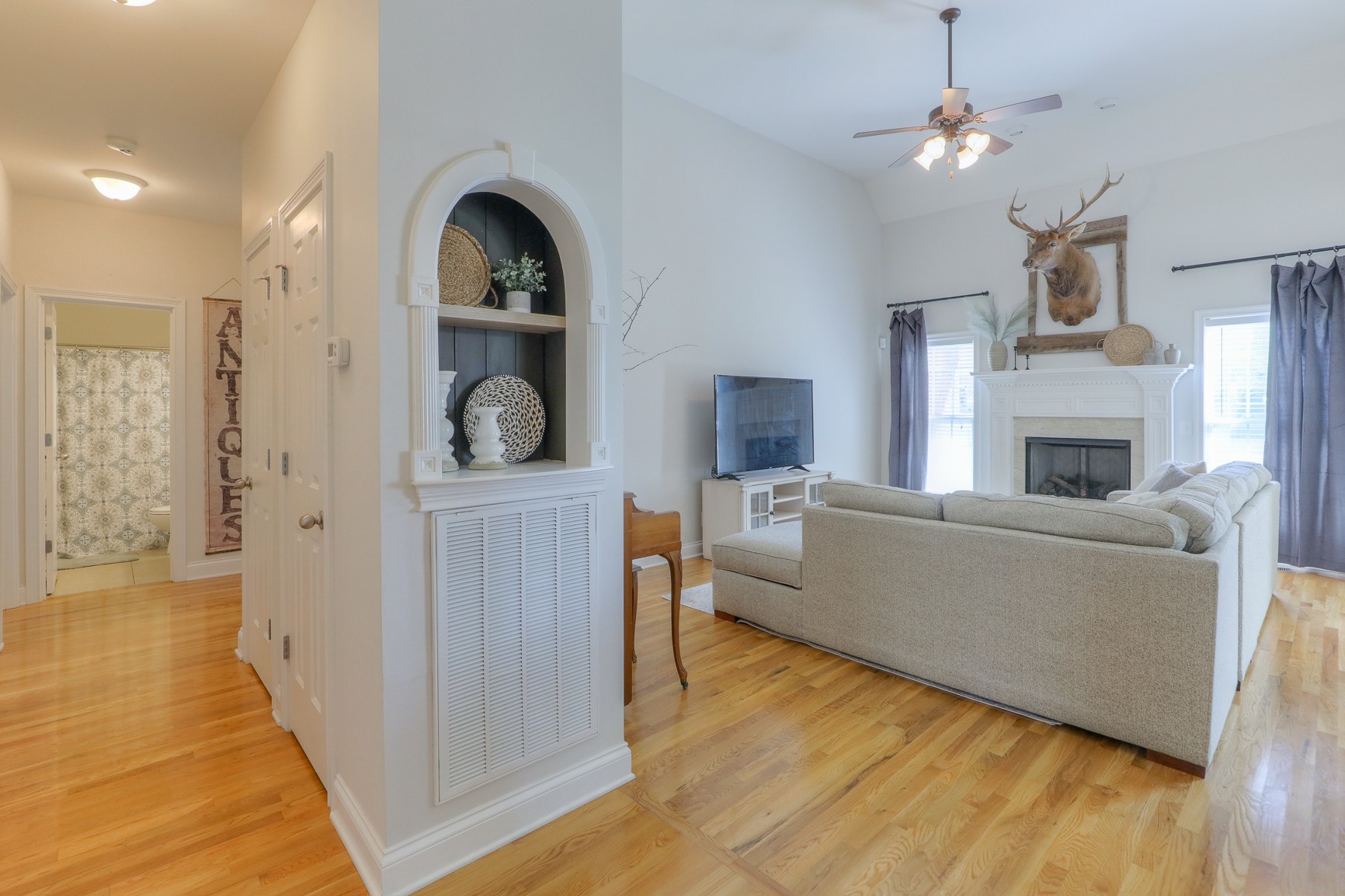 711 Heritage Road Lebanon, TN 37087 - Photo 8 of 49 a living room with furniture and a fireplace