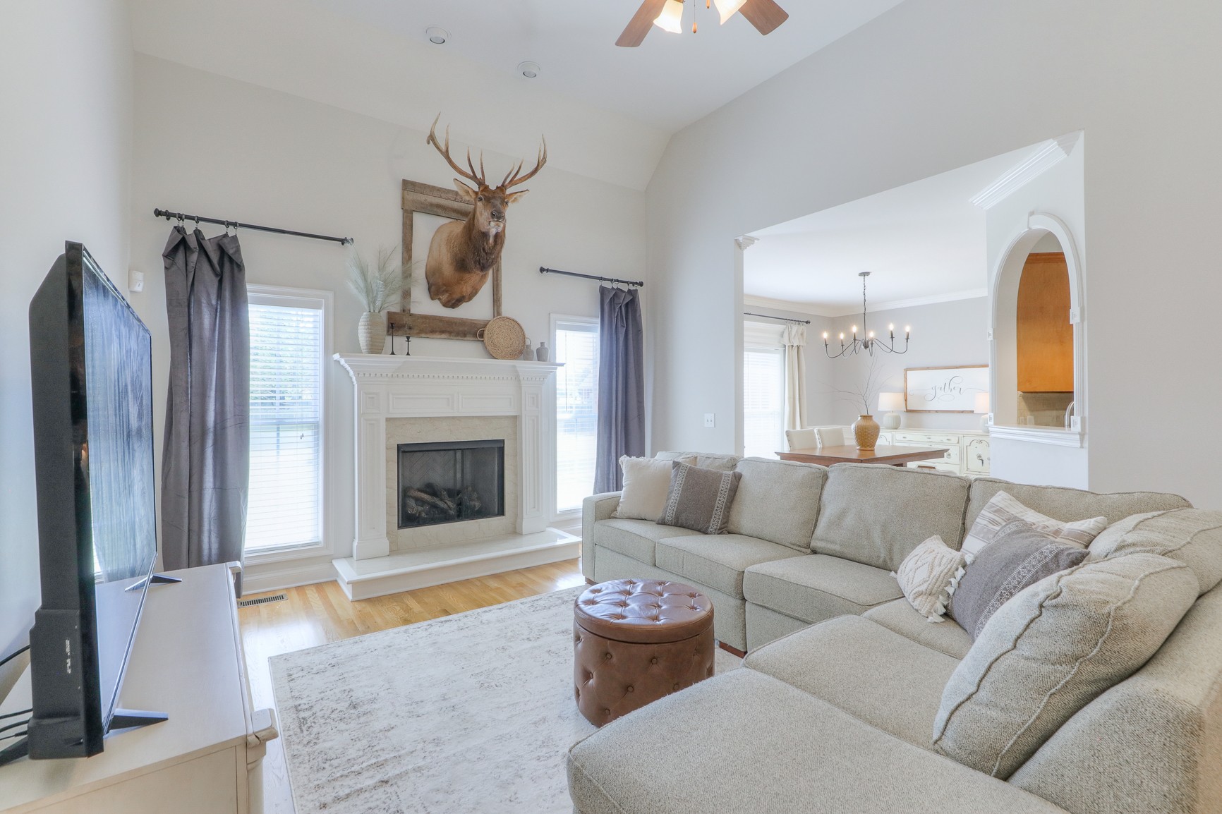 711 Heritage Road Lebanon, TN 37087 - Photo 9 of 49 a living room with furniture and a fireplace