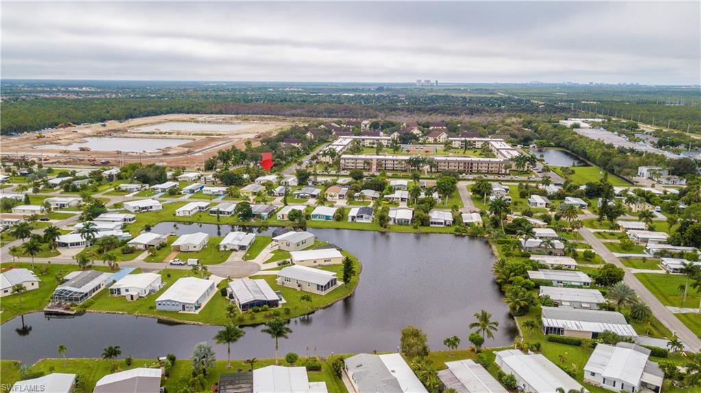 883 Manatee Road Naples, FL 34114 - Photo 3 of 15 an aerial view of residential houses with outdoor space