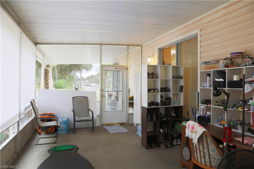 883 Manatee Road Naples, FL 34114 - Photo 8 of 15 a room with furniture toys and a window