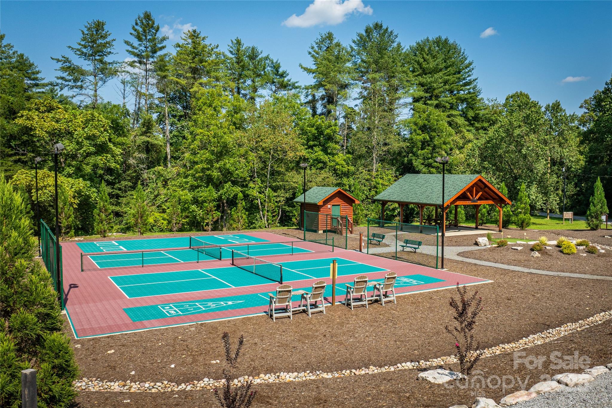 1038 Round Rock Road, Unit 49/50 Lenoir, NC 28645 - Photo 40 of 46 an outdoor space with swimming pool and furniture