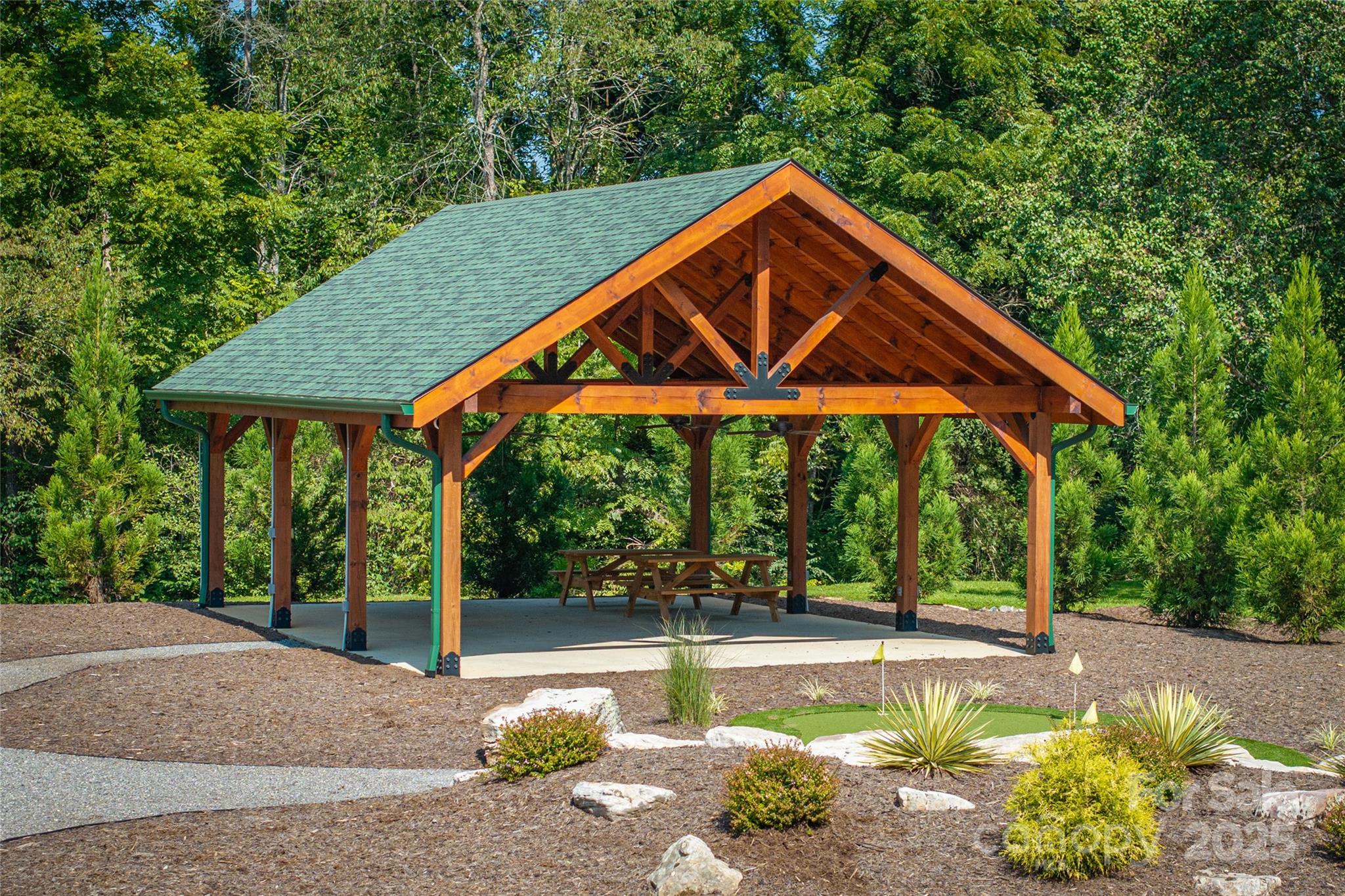 1038 Round Rock Road, Unit 49/50 Lenoir, NC 28645 - Photo 44 of 46 a front view of a house with garden