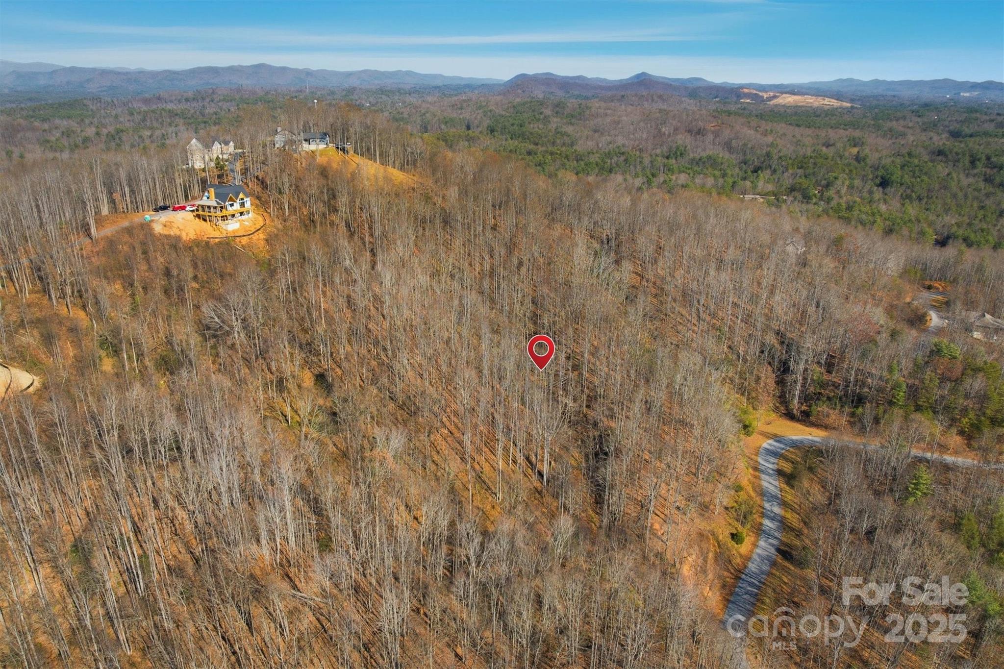 1038 Round Rock Road, Unit 49/50 Lenoir, NC 28645 - Photo 5 of 46 a view of lake with mountain