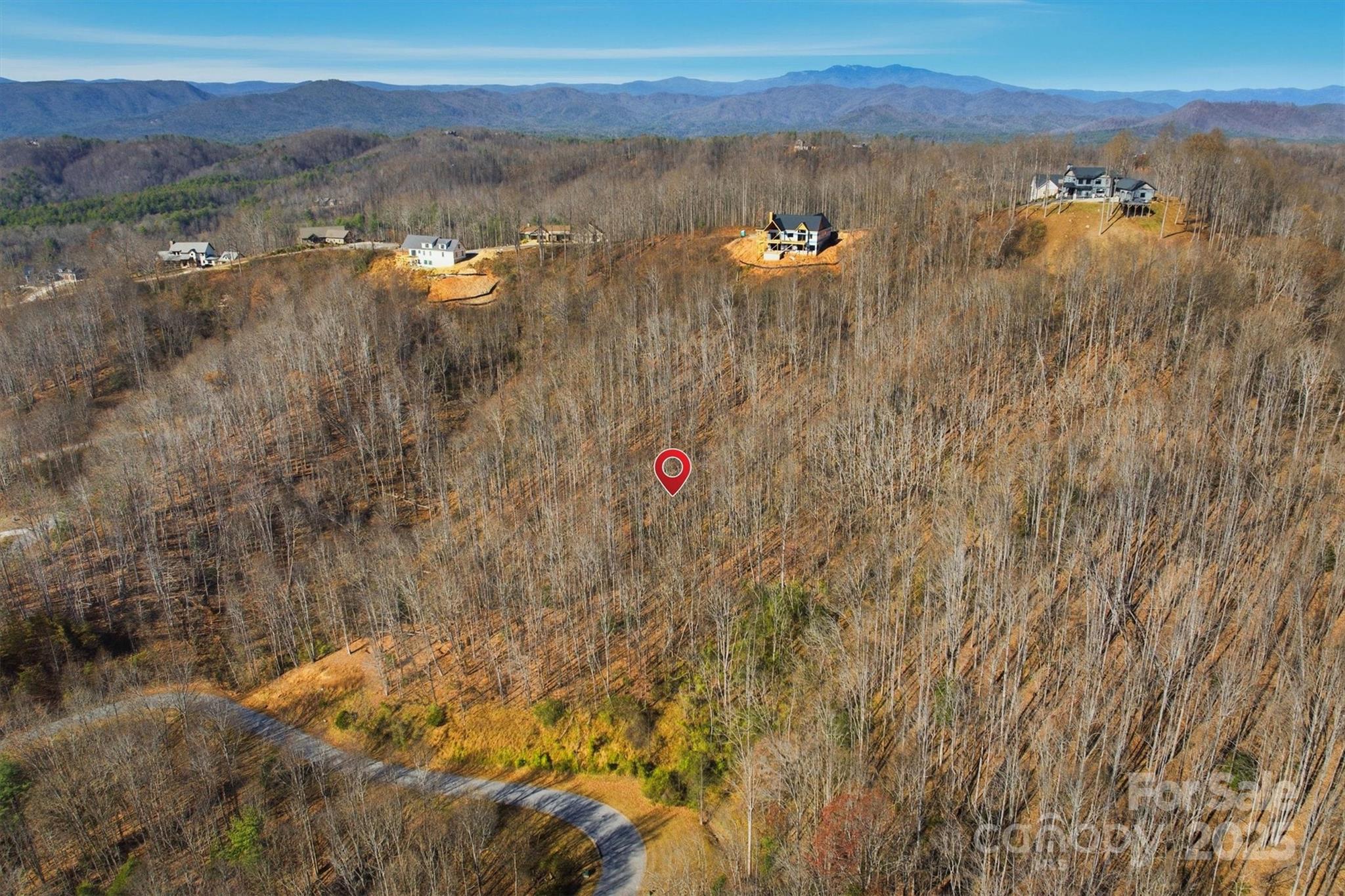 1038 Round Rock Road, Unit 49/50 Lenoir, NC 28645 - Photo 7 of 46 a view of lake with mountain