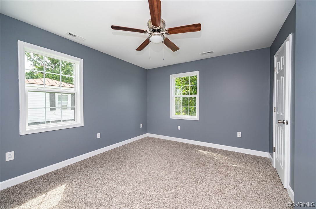 706 Rome Street Petersburg, VA 23803 - Photo 17 of 26 a view of an empty room with a window