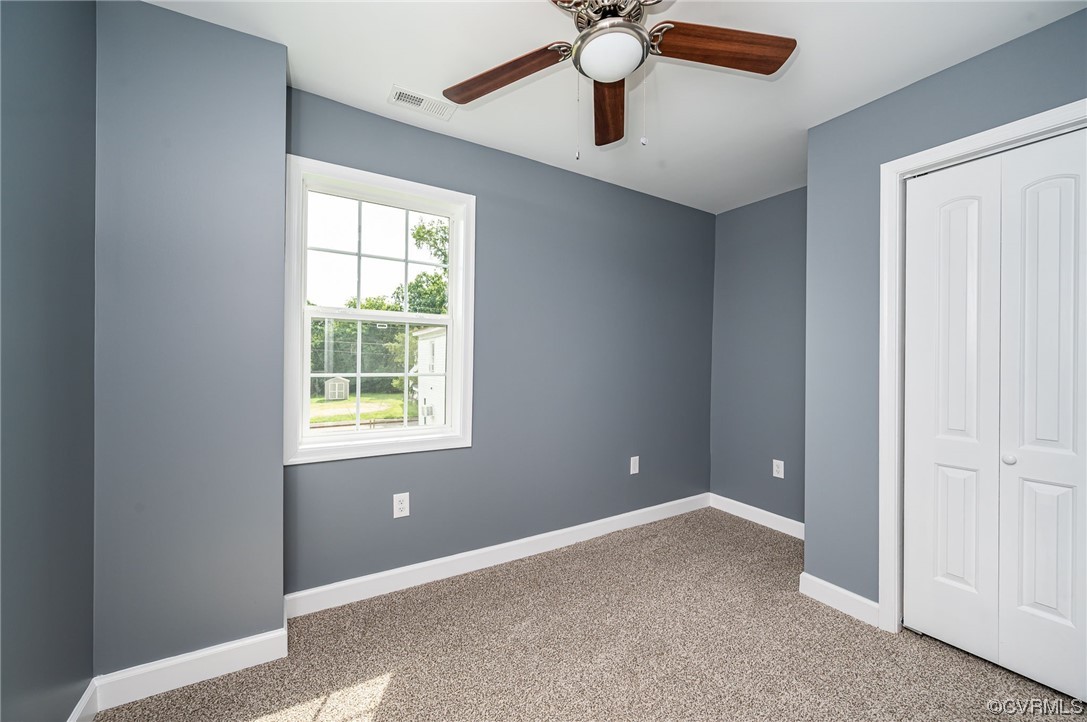 706 Rome Street Petersburg, VA 23803 - Photo 20 of 26 an empty room that has a window