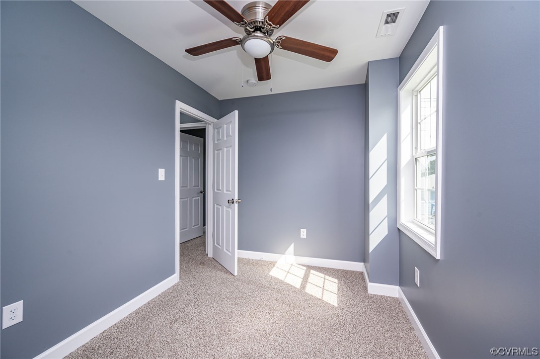 706 Rome Street Petersburg, VA 23803 - Photo 21 of 26 a view of an empty room with a window